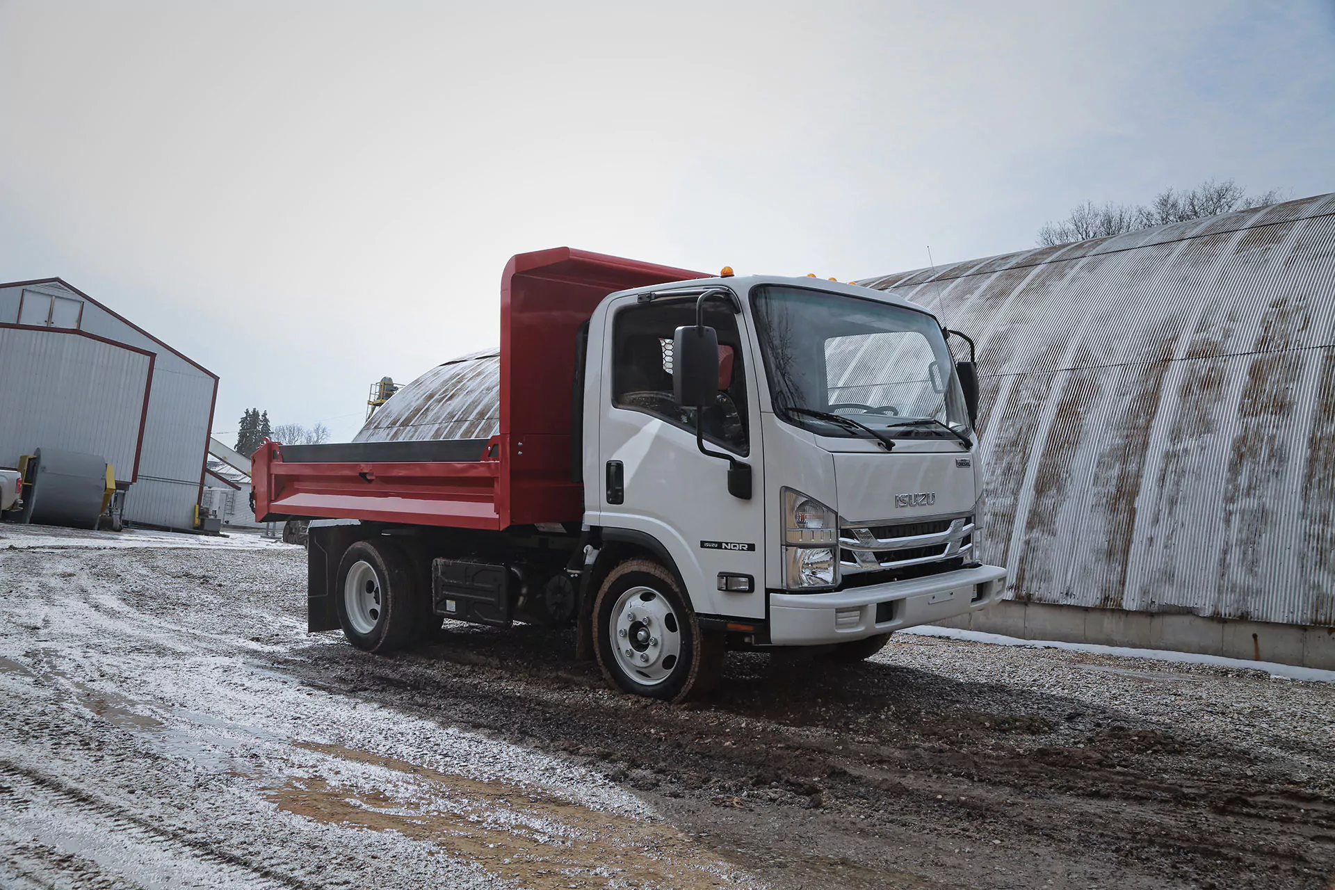 Isuzu commercial flat bed truck.